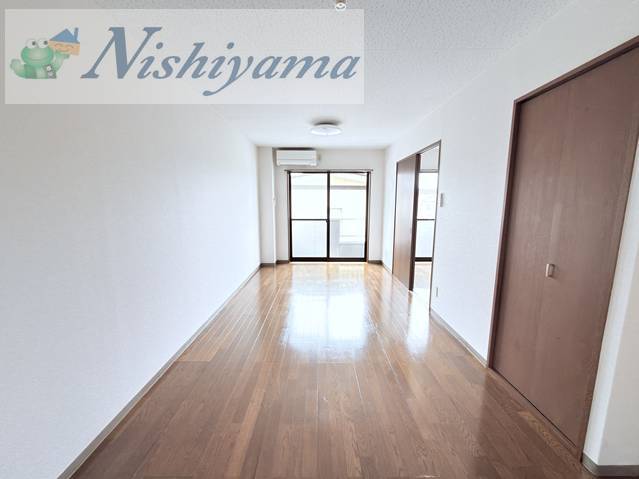 サンシャイン木場町の居間写真