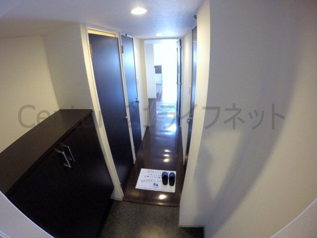 地下鉄御堂筋線 新大阪駅 徒歩5分 15階建 築18年の玄関写真