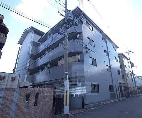 京都市中京区西ノ京銅駝町のマンションの建物外観
