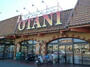 スーパー　フードオアシスOTANI鶴田店（スーパー）まで876m