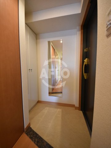 プレサンス本町リアルシティの玄関写真