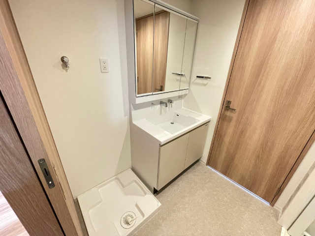 洗面設備　２０２号室の写真になります。