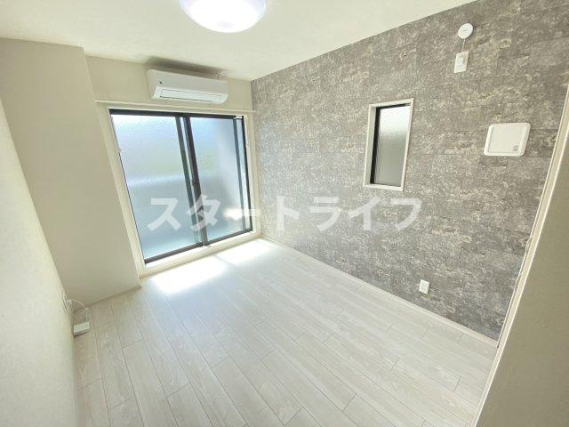 地下鉄御堂筋線 西中島南方駅 徒歩9分 3階建 築1年の居間写真