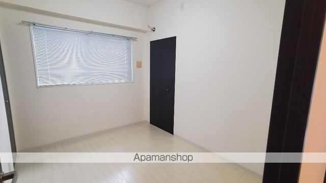 阪急神戸線 十三駅 徒歩8分 9階建 築20年の居間写真