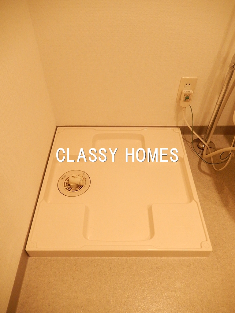 その他設備　2005年竣工　アイムズ芝大門：洗濯機置き場