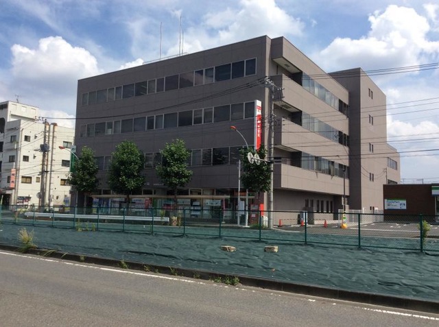 郵便局　登戸郵便局（郵便局）まで479m