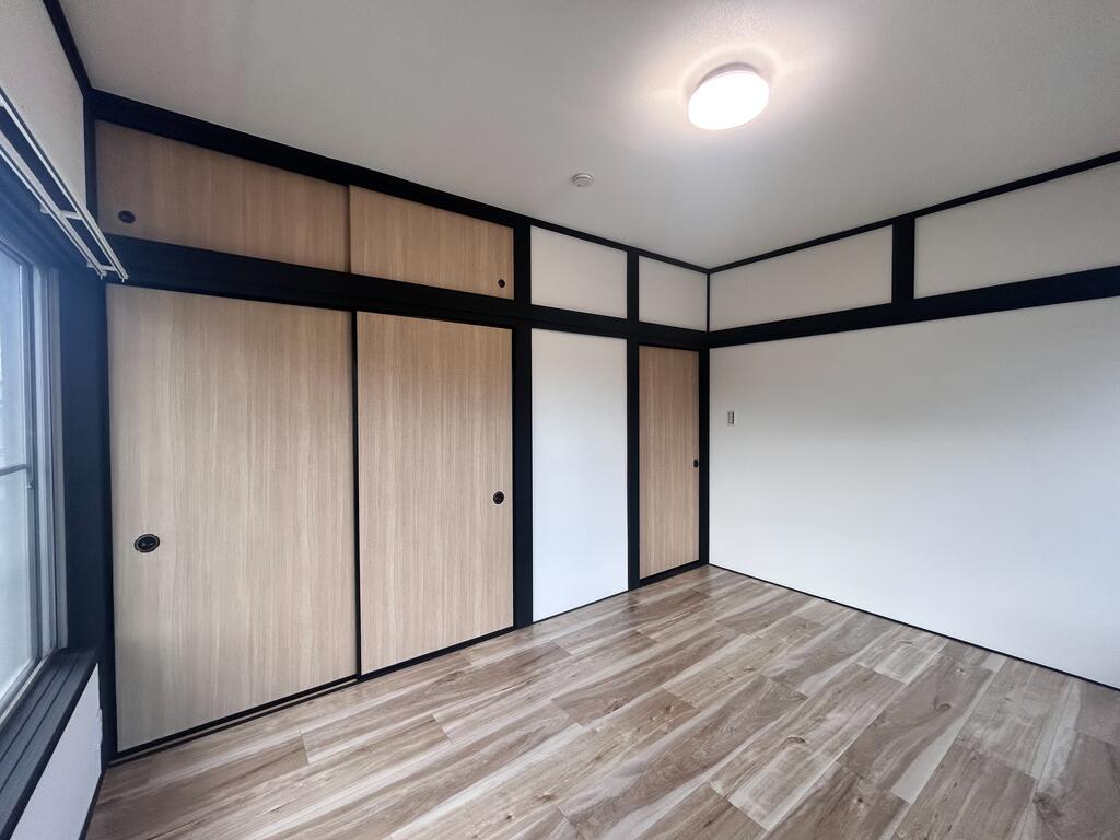 ETOILE弐分方町貸家の居間写真