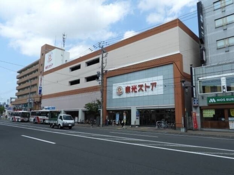 スーパー　東光ストア麻生店（スーパー）まで418m