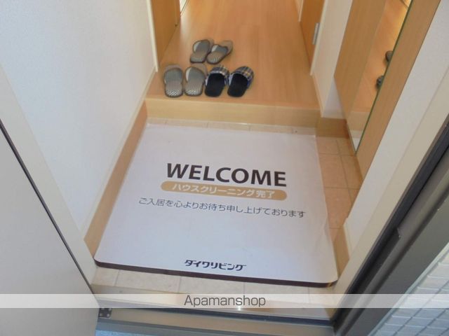 カーサ アピオ Aの玄関写真