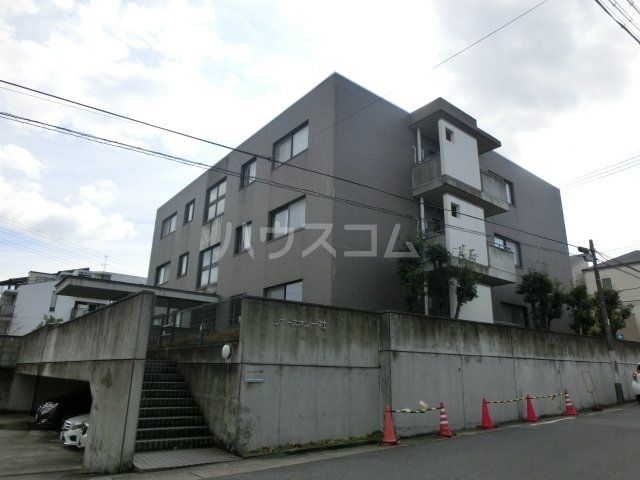 名古屋市名東区亀の井のマンションの建物外観