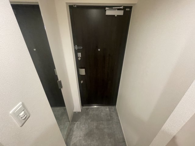 プレサンス塚本アクミリオンの玄関写真
