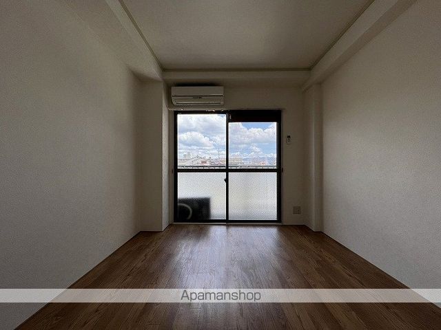 シャルマン加美東の居間写真