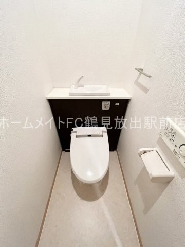地下鉄長堀鶴見緑地線 鶴見緑地駅 徒歩13分 5階建 築15年のトイレ写真