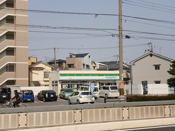 コンビニ　ファミリーマート西淀川野里店（コンビニ）まで338m