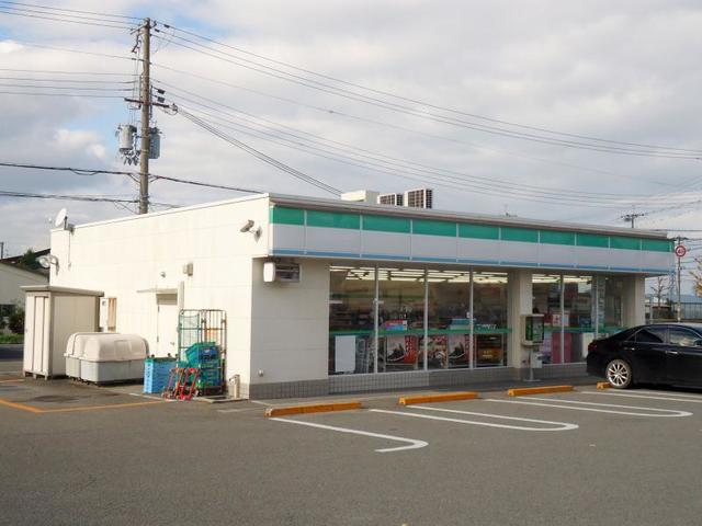 コンビニ　ファミリーマート泉佐野日根野店（コンビニ）まで702m