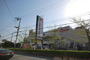 スーパー　イズミヤ交野店（スーパー）まで1121m