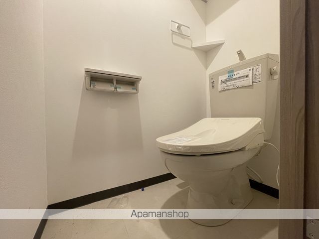 地下鉄東西線 二十四軒駅 徒歩5分 4階建 築1年のトイレ写真