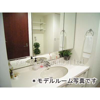 洗面設備　同タイプ24階のお部屋を撮影。仕様が異なることがあります。