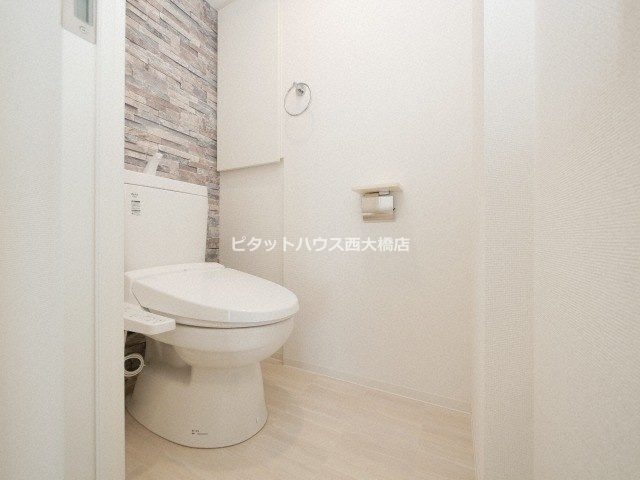 地下鉄千日前線 野田阪神駅 徒歩1分 15階建 築5年のトイレ写真