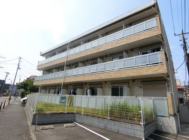 【川崎市川崎区渡田向町のマンションの建物外観】