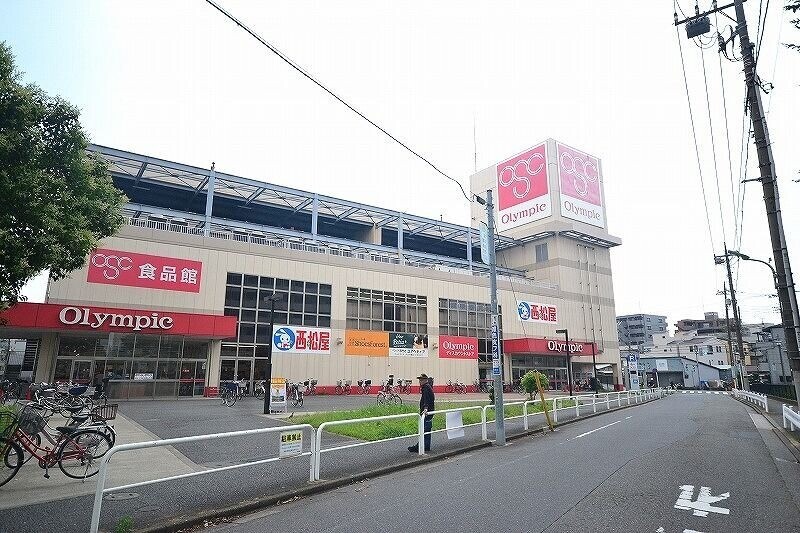 ショッピングセンター　オリンピック　本羽田店（ショッピングセンター）まで629m