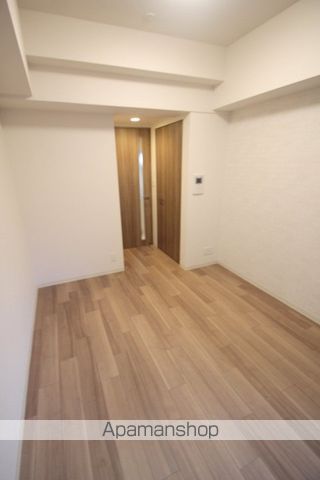 プレサンス堺筋本町駅前シェルの居間写真