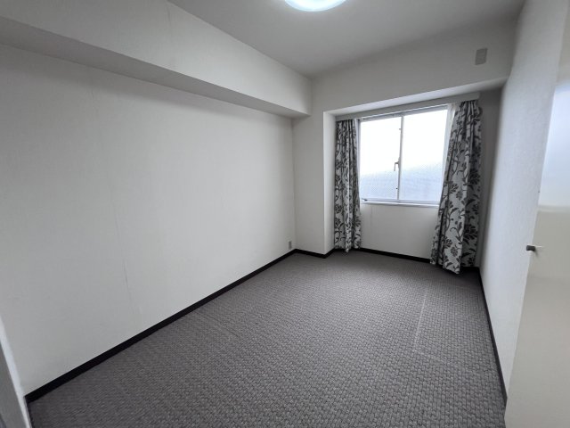 コスモ西新井クレステイジの居間写真
