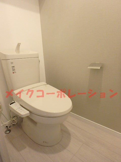 トイレ　※入居中の為別部屋写真使用現状優先