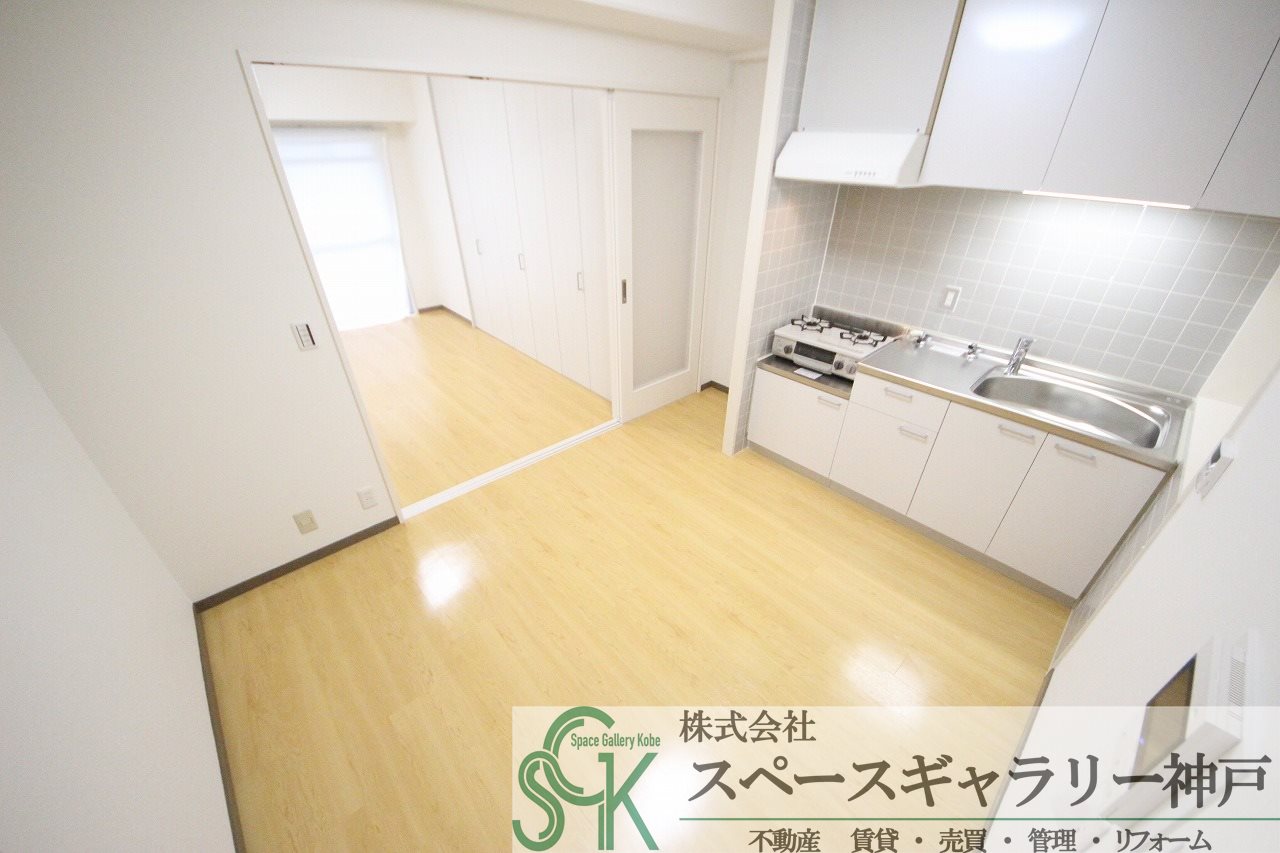 西鈴蘭台シティコートの居間写真