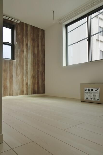 ＪＲ中央線 西荻窪駅 徒歩10分 3階建 築9年の居間写真