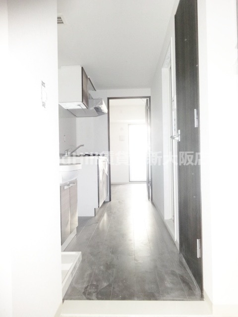 玄関　プレミアムステージ新大阪駅前II