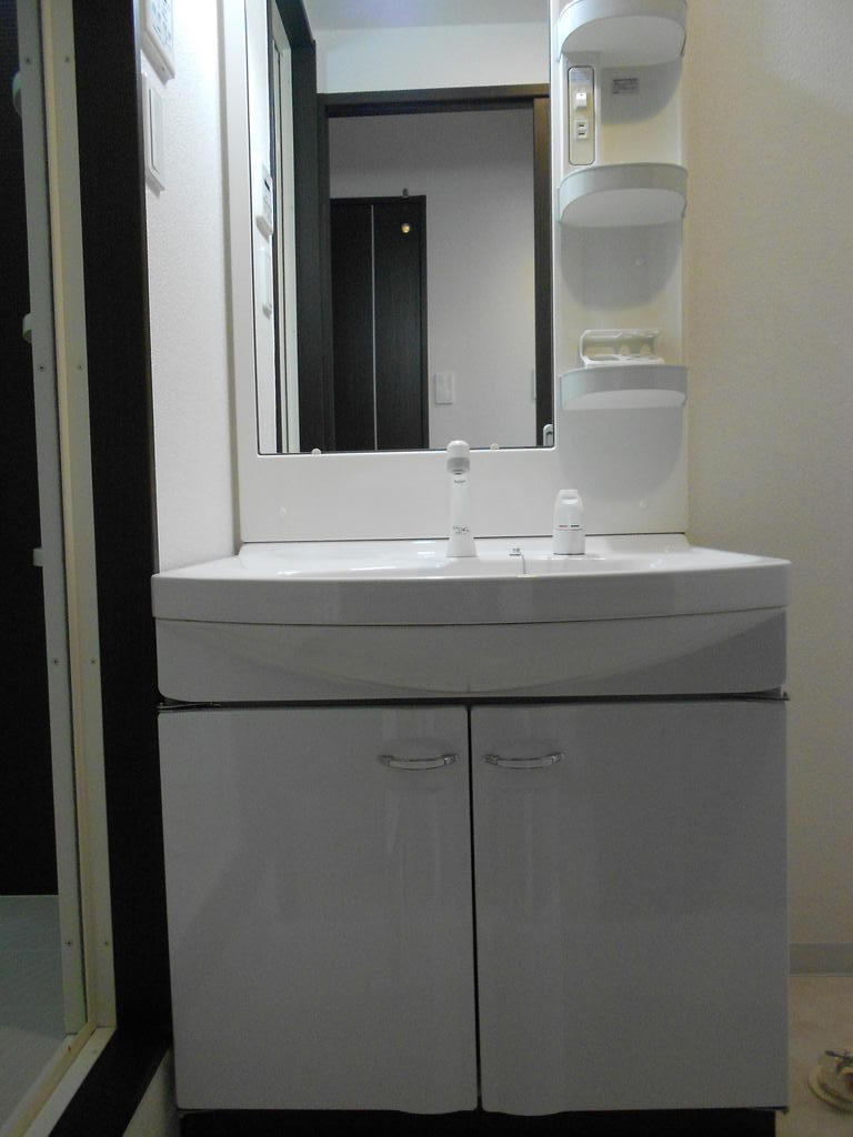 洗面設備　同タイプ同モデルの写真を使用