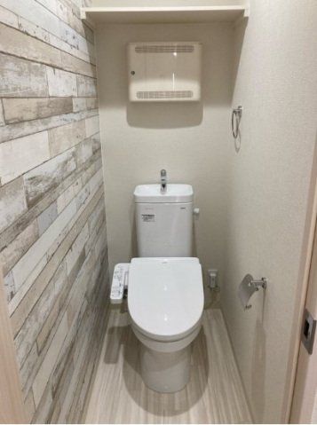 トイレ　デザインクロスのトイレです。