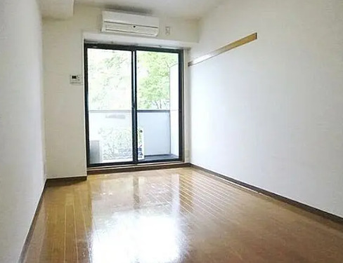 居室・リビング　別部屋の写真を使用しております。