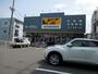 ショッピングセンター　ワークマン足立区役所前店（ショッピングセンター）まで960m