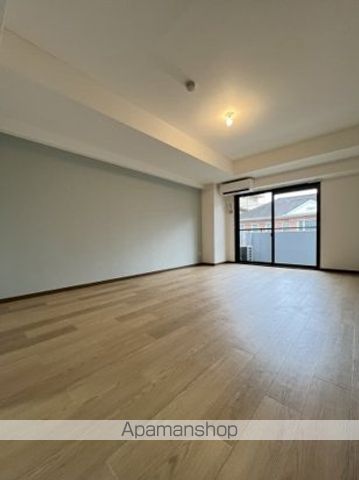 多摩都市モノレール 泉体育館駅 徒歩12分 7階建 築38年の居間写真