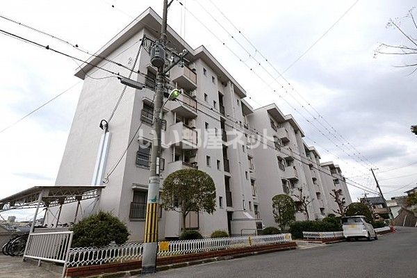 堺市西区上野芝町のマンションの建物外観