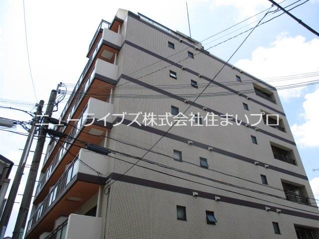 寝屋川市萱島本町のマンションの建物外観