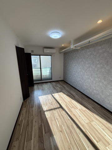 居室・リビング　写真は別室のものとなります。