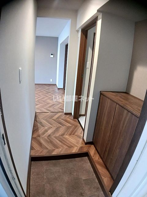 マンション司Iの玄関写真