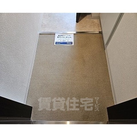 地下鉄谷町線 野江内代駅 徒歩4分 10階建 築22年の玄関写真