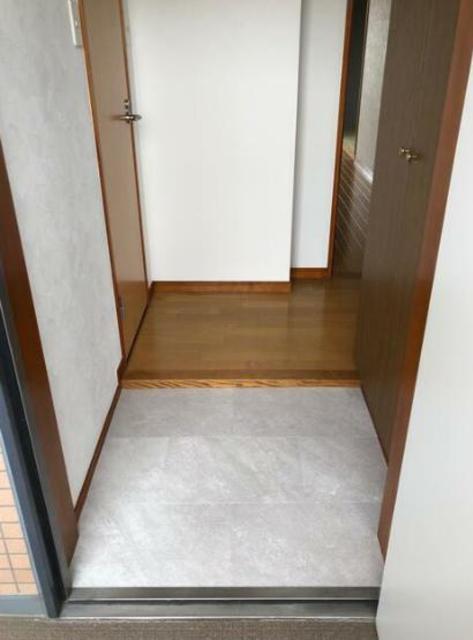 柿生駅前鈴木ビルの玄関写真
