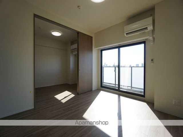 地下鉄鶴舞線 浄心駅 徒歩4分 15階建 築2年の居間写真