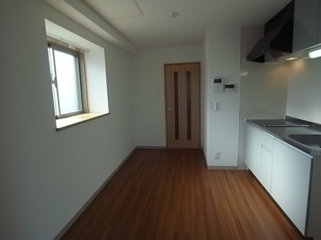 SUNNY COURT MEIWAの居間写真