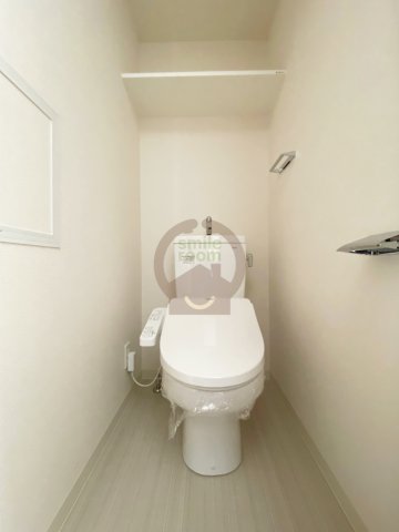 地下鉄中央線 九条駅 徒歩2分 14階建 築7年のトイレ写真