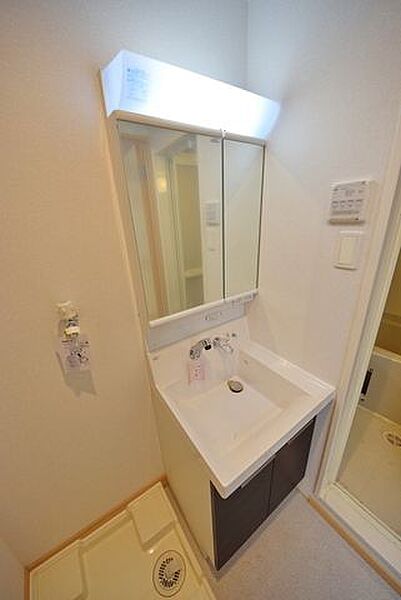 洗面設備　※別部屋の参考写真です。