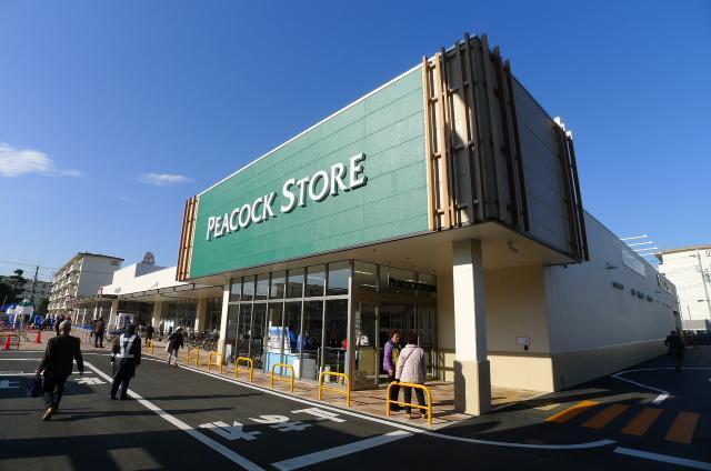 スーパー　ピーコックストア（スーパー）まで487m