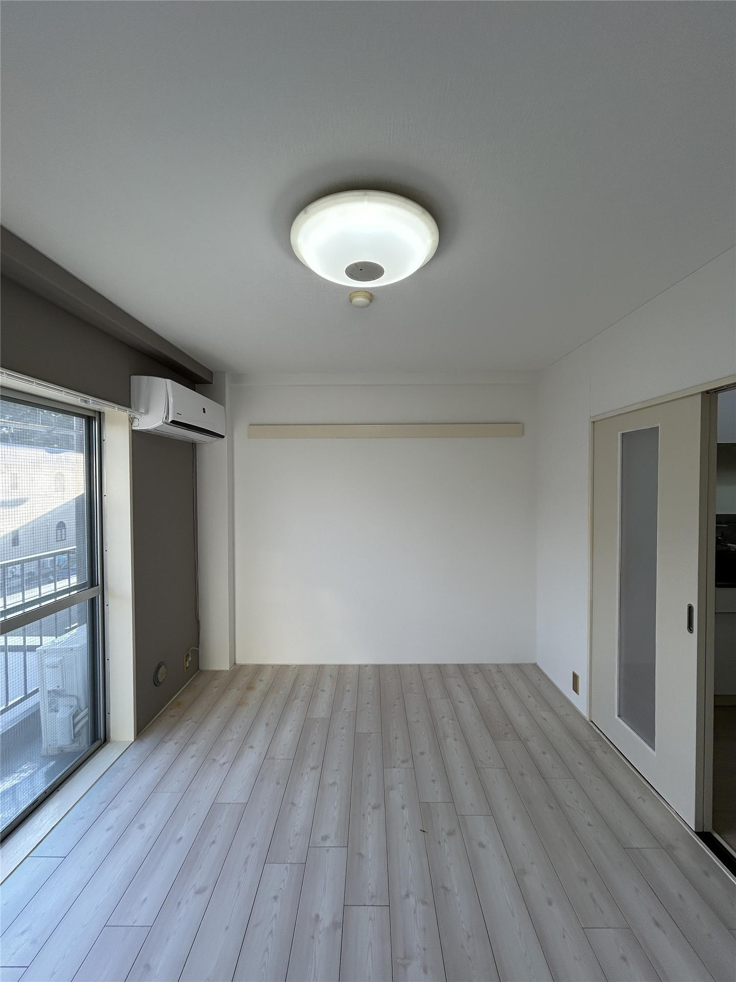 アシスト山形第3マンションの居間写真