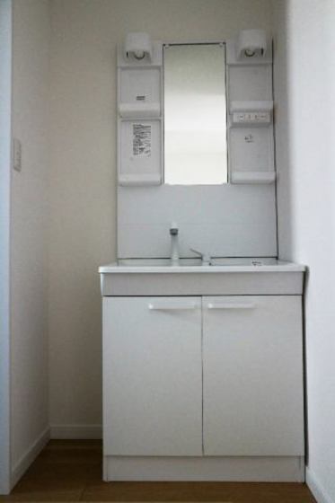 洗面設備　※他号室の写真です