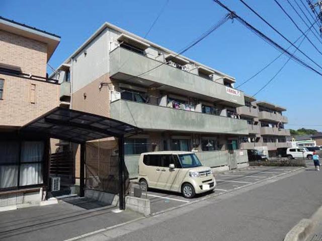 【鹿児島市広木のマンションの建物外観】